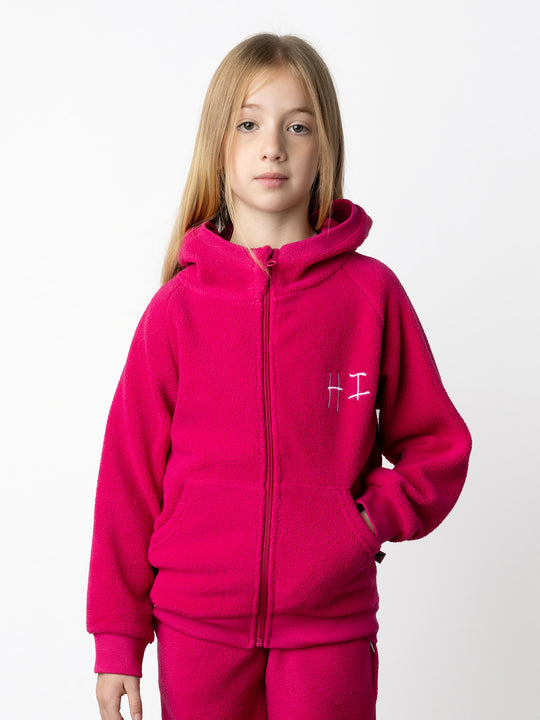 Minti kids clothing. Super cosy and soft Zip Up made in teddy with 2x2 rib cuffs and hem. Front pocket to keep hands warm. 70% Polyester // 30% Cotton.