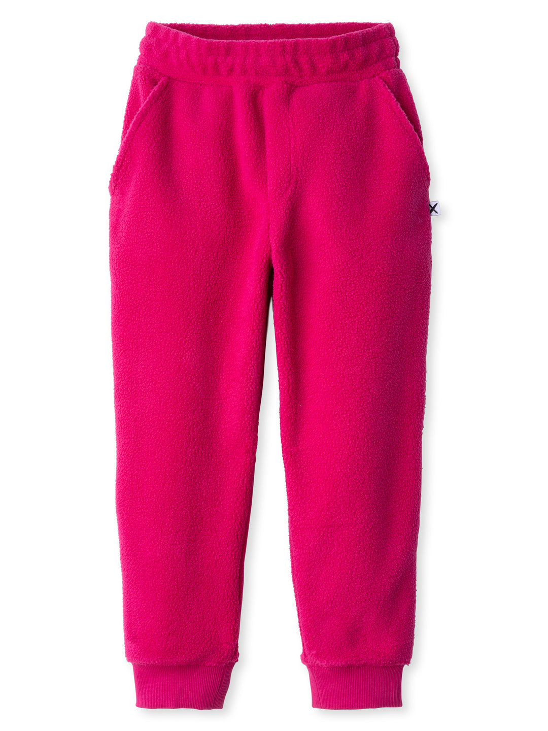 Minti kids clothing. Super cosy and soft loose leg trackies made in teddy with 2x2 rib cuffs. Front pocket to keep hands warm. Small Minti embroidery on the back. 70% Polyester // 30% Cotton.