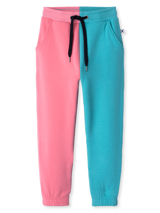 Minti kids clothing. Wider leg trackies with front pockets, shoelace cord, 2x2 rib elasticated waistband and gathered cuffs. Small Minti embroidery on the back. 330 Gram // Brushed Inside // 95% Cotton // 5% Elastane.