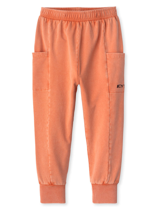 Minti kids clothing. Super cosy slip on trackies with elasticated waistband, drop crotch, super cool side pockets and 2x2 rib cuffs. 260 Gram // 95% Cotton // 5% Elastane.