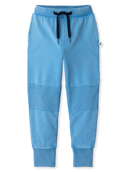 Minti kids clothing. Straight leg trackies with reinforced 2x2 rib knee patches, front pockets, elasticated waistband with shoelace cord and a 2x2 rib back pocket. 260 Gram // 95% Cotton // 5% Elastane.