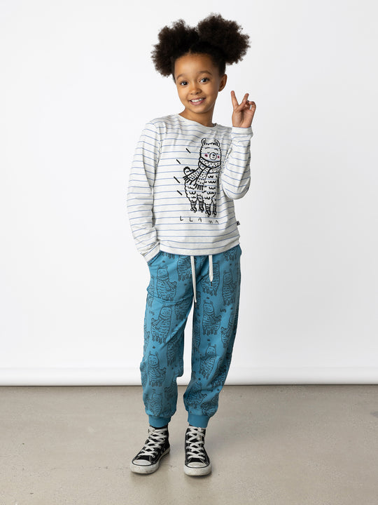 Minti kids clothing. Boxy style long sleeved tee. 190 Gram // 95% Cotton // 5% Elastane.