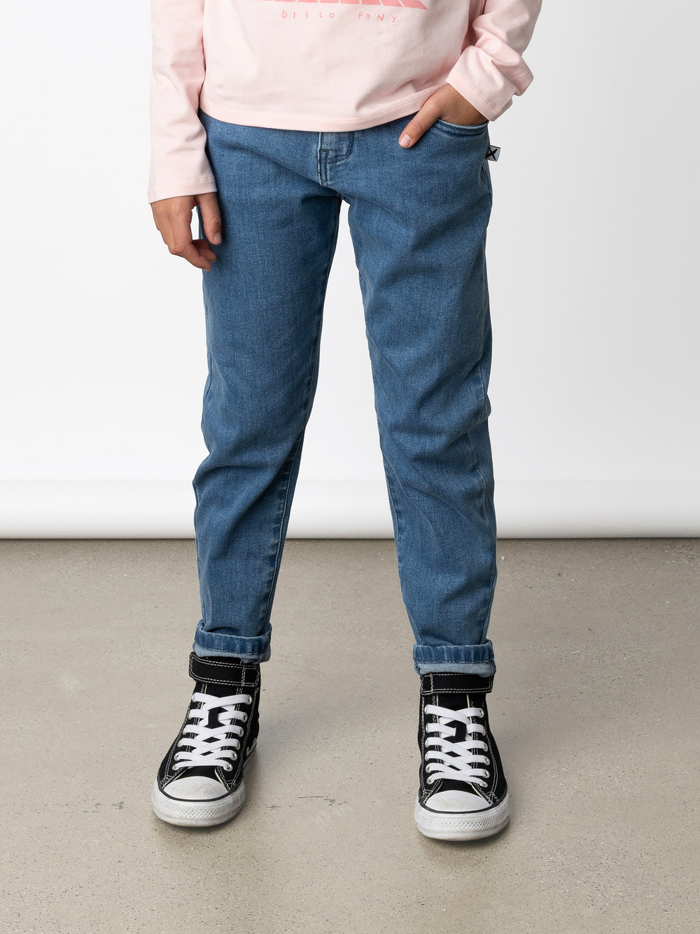 Minti kids clothing. Super cool straight leg denim jeans with front pockets and back pockets. Adjustables in the waistband for sizing. Small embroidery on the back. Super comfy stretch denim. Cotton // Polyester // Elastane.