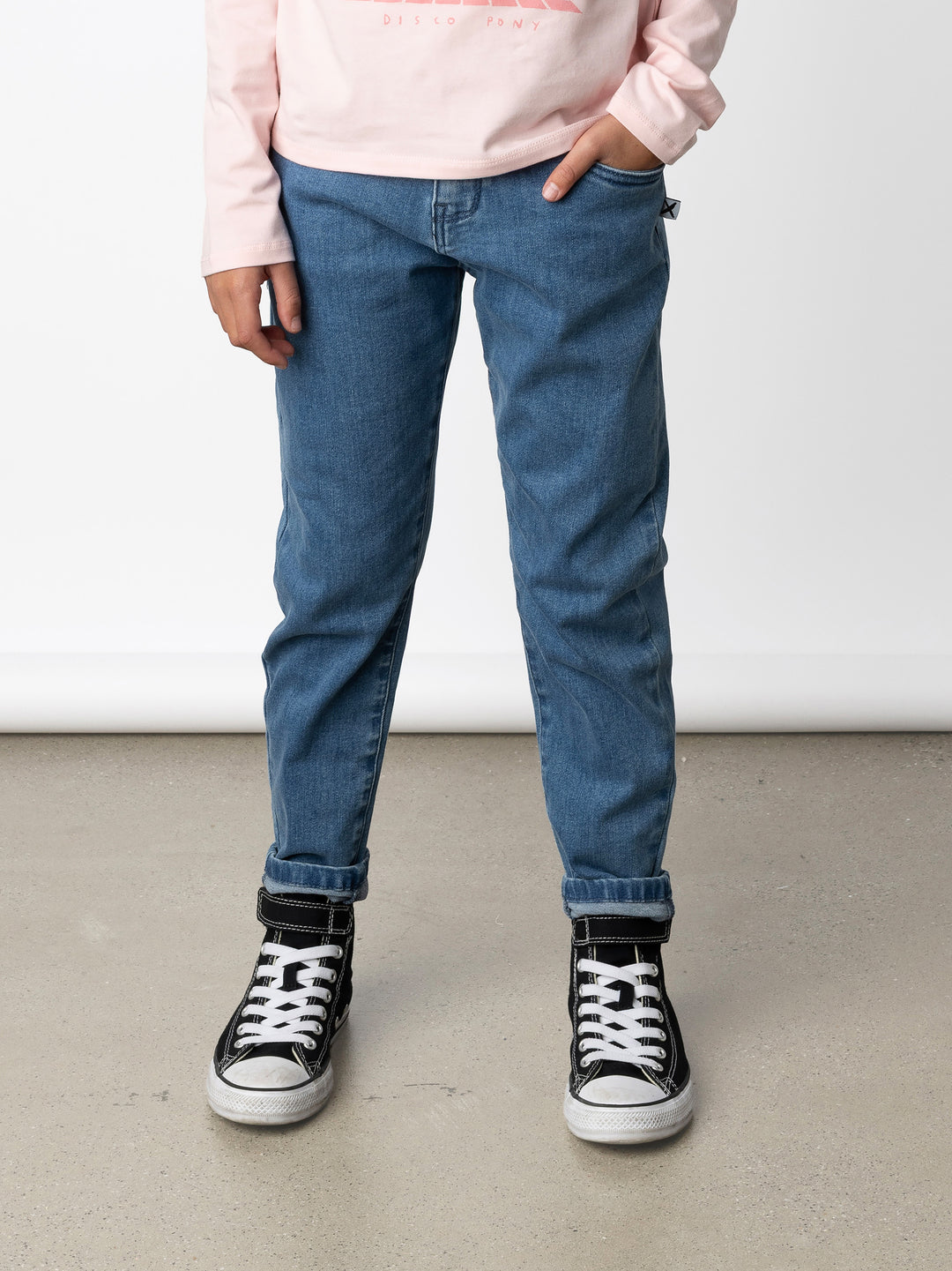 Minti kids clothing. Super cool straight leg denim jeans with front pockets and back pockets. Adjustables in the waistband for sizing. Small embroidery on the back. Super comfy stretch denim. Cotton // Polyester // Elastane.