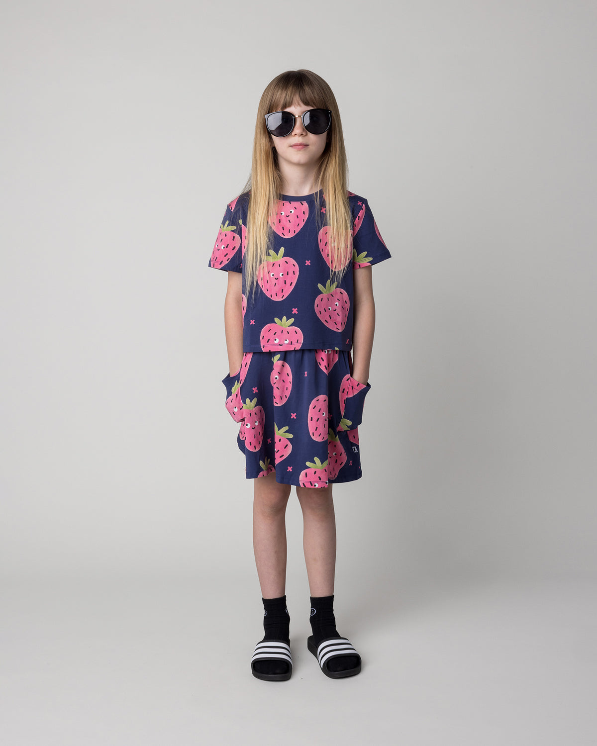 Girls Happy Strawberry cropped tee and skirt outfit from Minti
