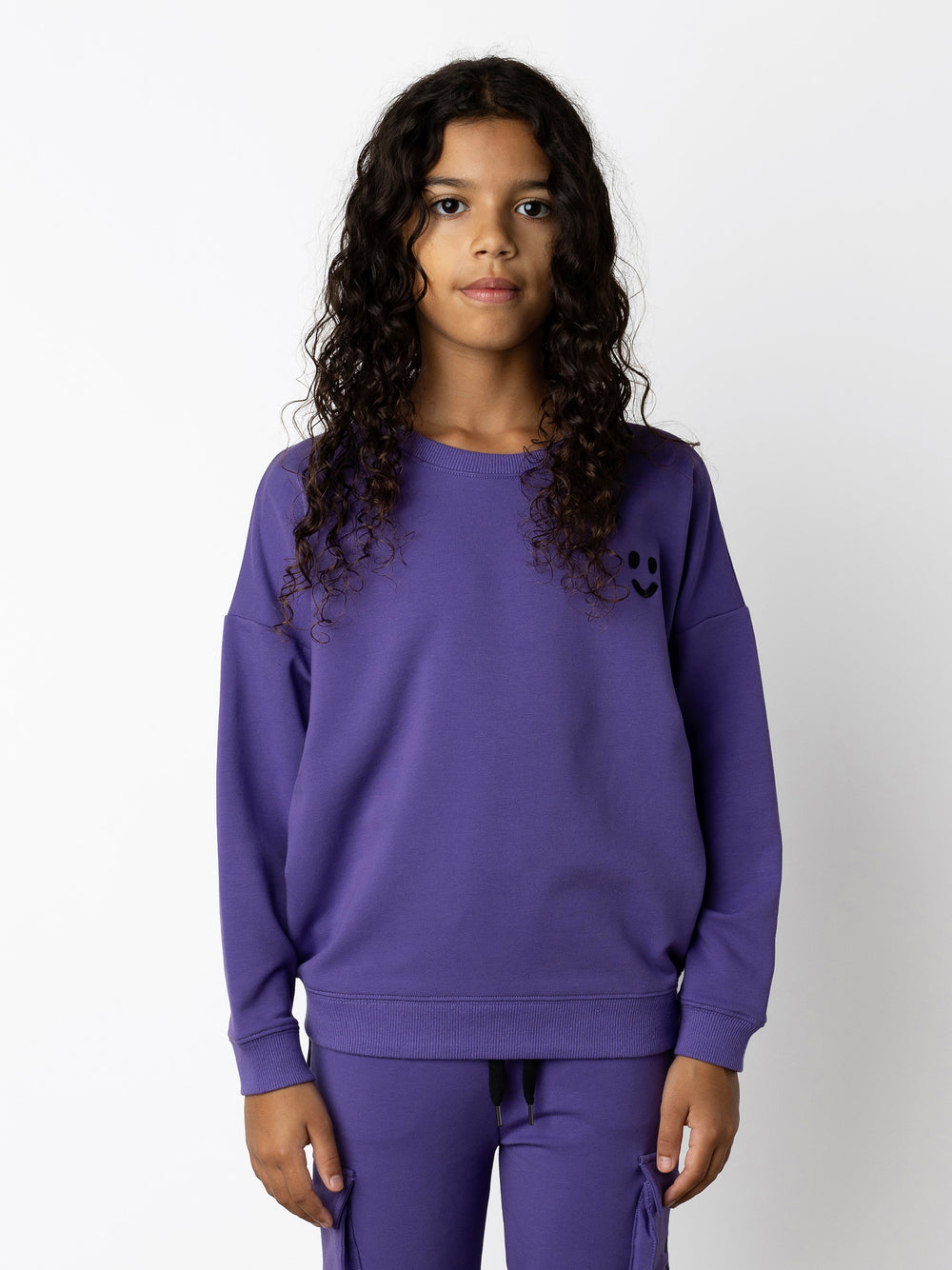 Minti kids clothing. Super cosy oversized fit crew with drop shoulder detail. 2x2 Rib at the neck, hem and cuffs. 320 Gram // 95% Cotton // 5% Elastane.