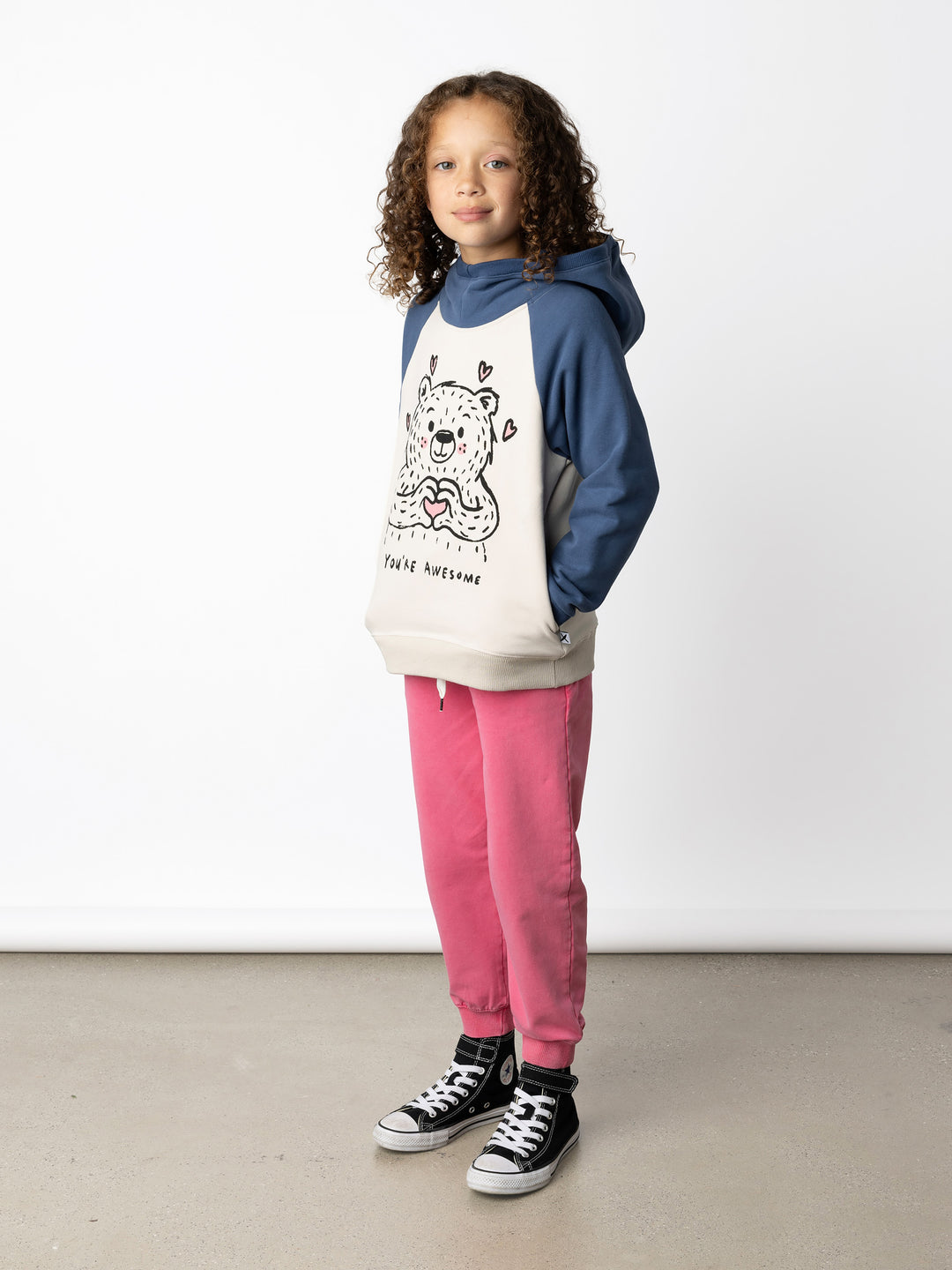 Minti kids clothing. Super soft hoodie with hidden pockets in the side seams. The ribbed-trim hood makes it extra cosy. Soft brushed 'furry' inside. 2x2 Rib at the neck, hem and cuffs. We recommend going up a size for this style. 330 Gram // Brushed Inside // 95% Cotton // 5% Elastane.