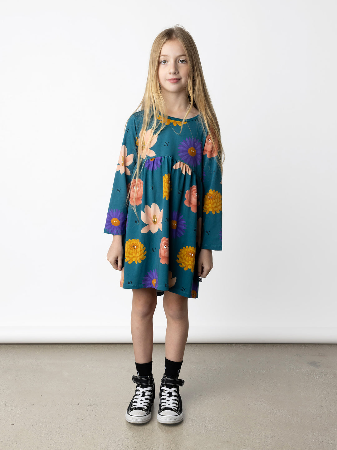 Minti kids clothing. Comfy tshirting weight dress with curved ruched front seam, hidden side pockets and scooped back hem. 190 Gram // 95% Cotton // 5% Elastane.