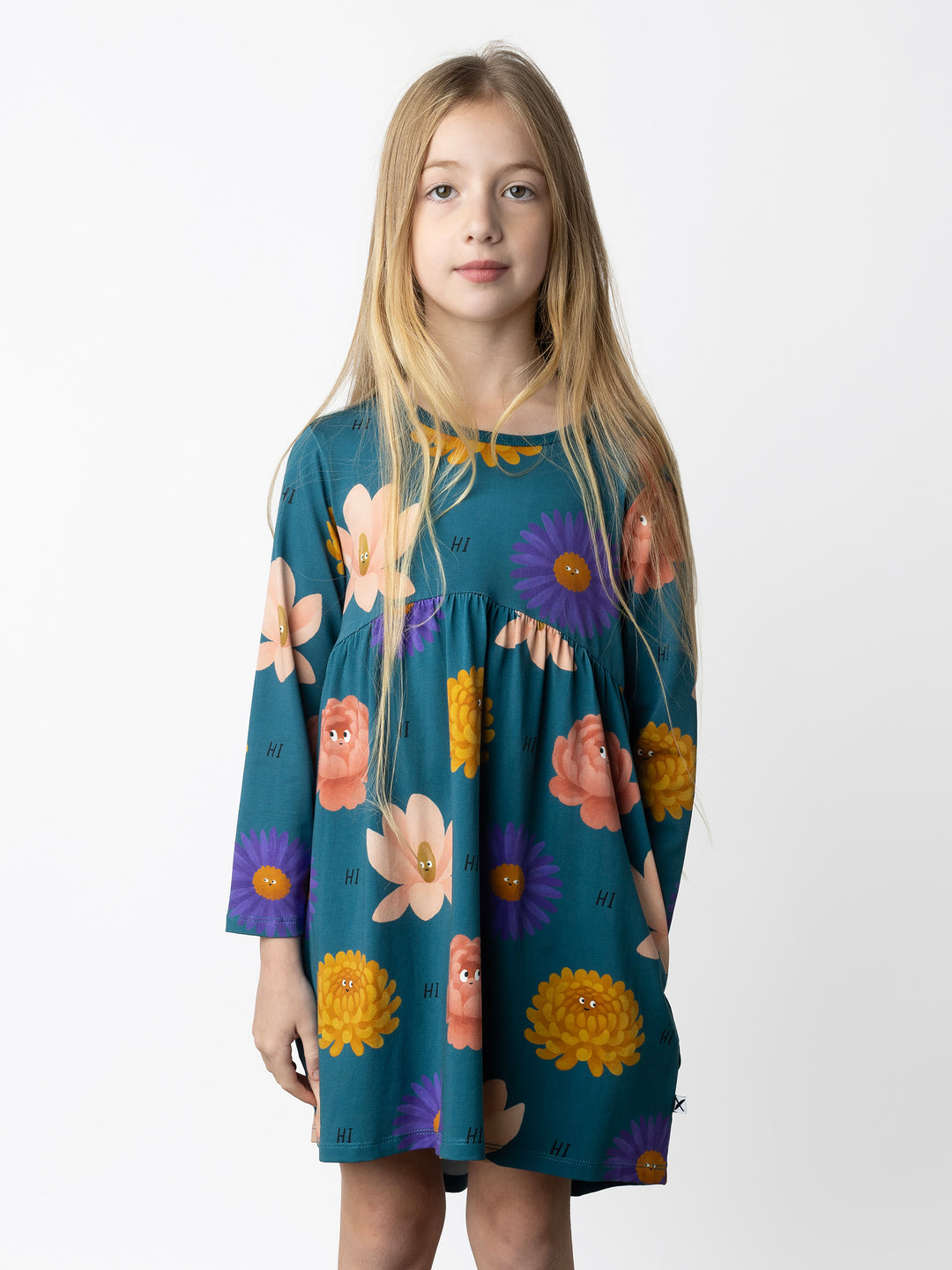 Minti kids clothing. Comfy tshirting weight dress with curved ruched front seam, hidden side pockets and scooped back hem. 190 Gram // 95% Cotton // 5% Elastane.