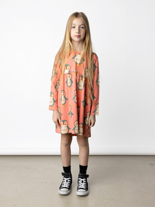 Minti kids clothing. Comfy tshirting weight dress with curved ruched front seam, hidden side pockets and scooped back hem. 190 Gram // 95% Cotton // 5% Elastane.