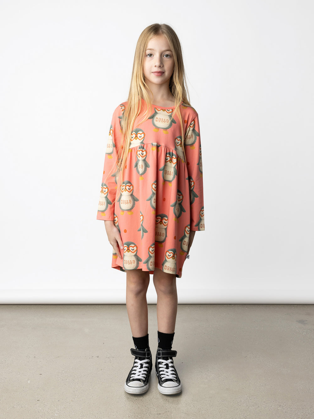Minti kids clothing. Comfy tshirting weight dress with curved ruched front seam, hidden side pockets and scooped back hem. 190 Gram // 95% Cotton // 5% Elastane.