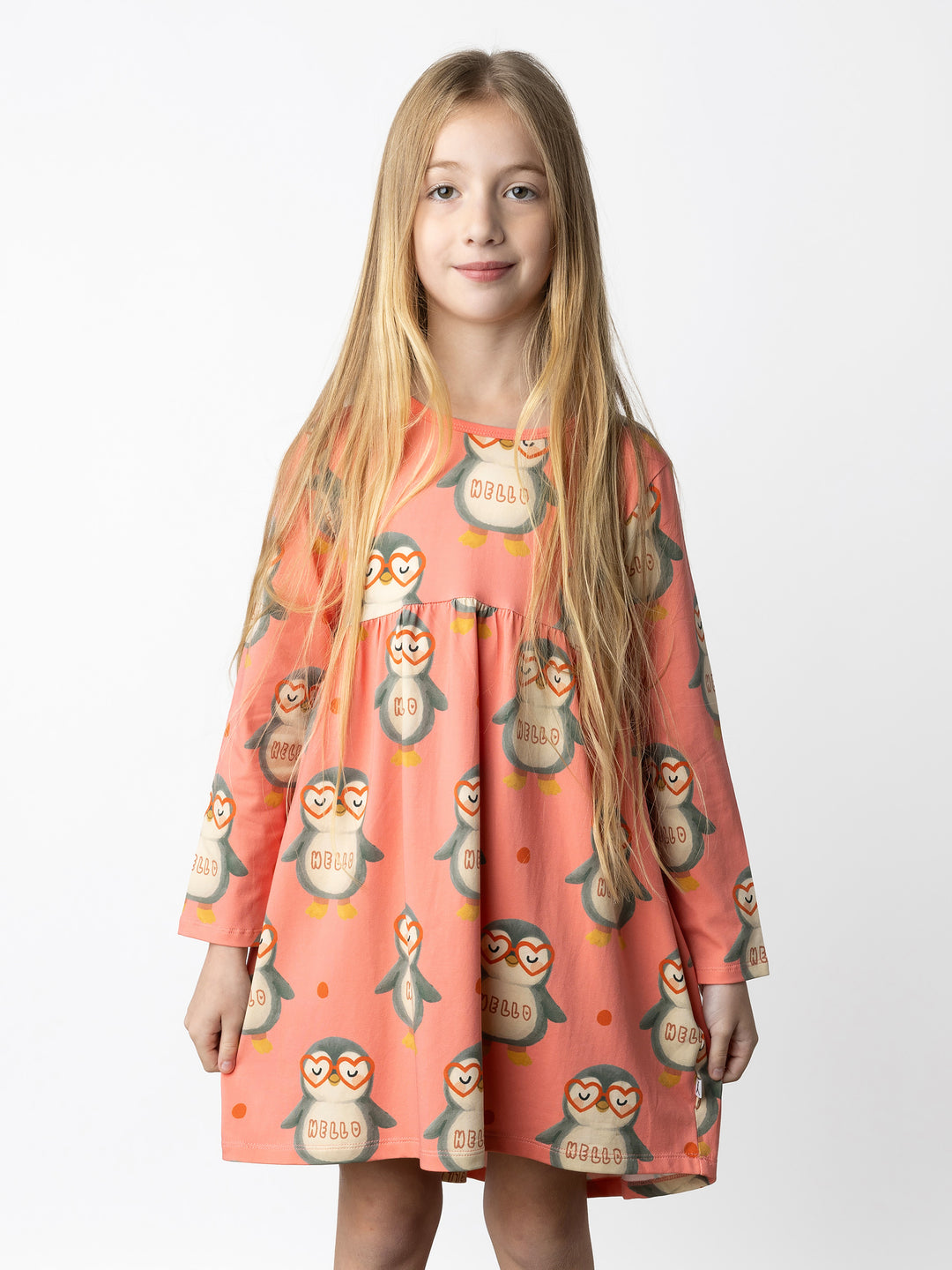 Minti kids clothing. Comfy tshirting weight dress with curved ruched front seam, hidden side pockets and scooped back hem. 190 Gram // 95% Cotton // 5% Elastane.