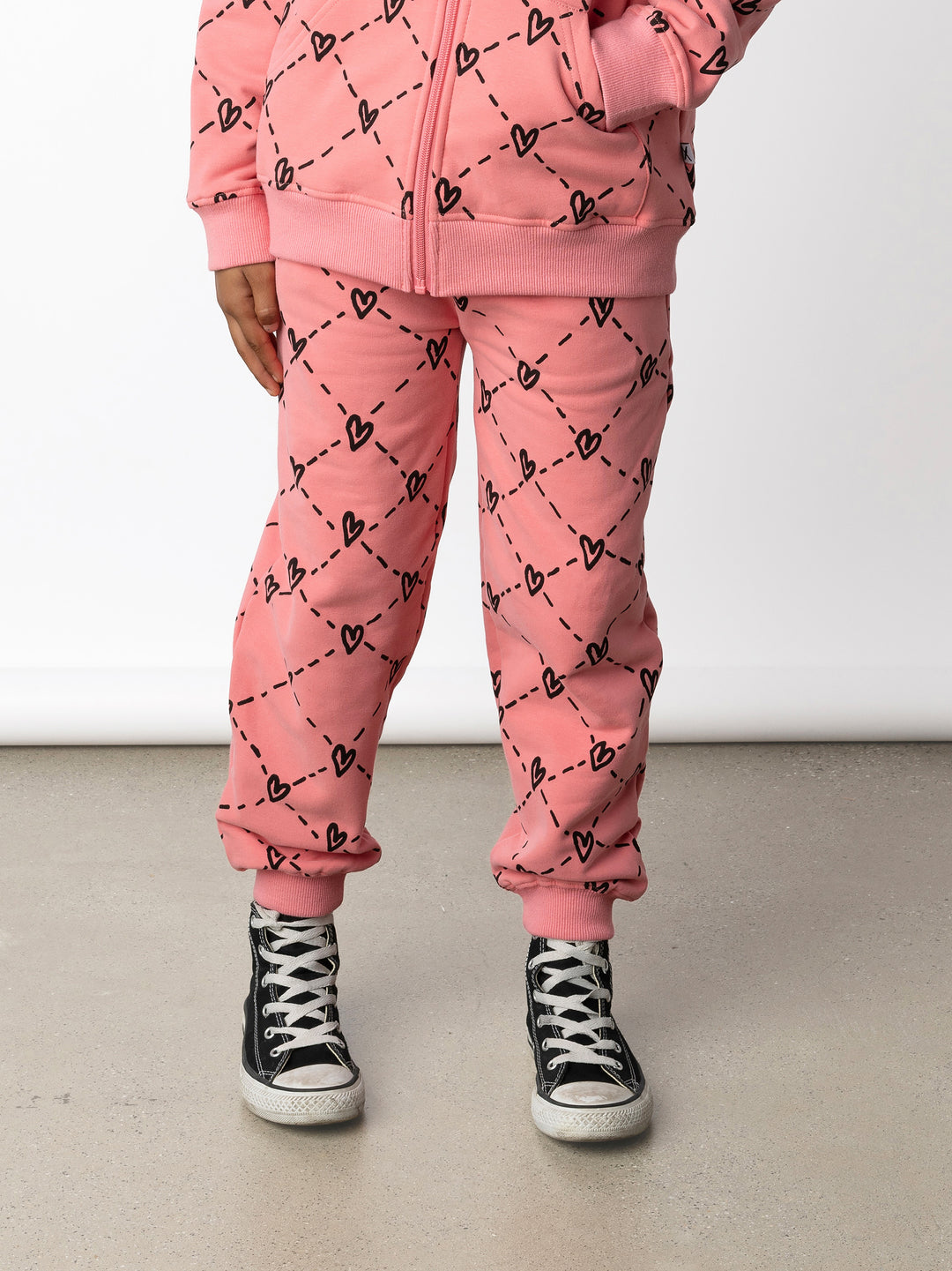 Minti kids clothing. Relaxed fit trackies with cosy side pockets, elasticated waistband, shoelace cord and 2x2 Rib cuffs. 330 Gram // Brushed Inside // 95% Cotton // 5% Elastane.