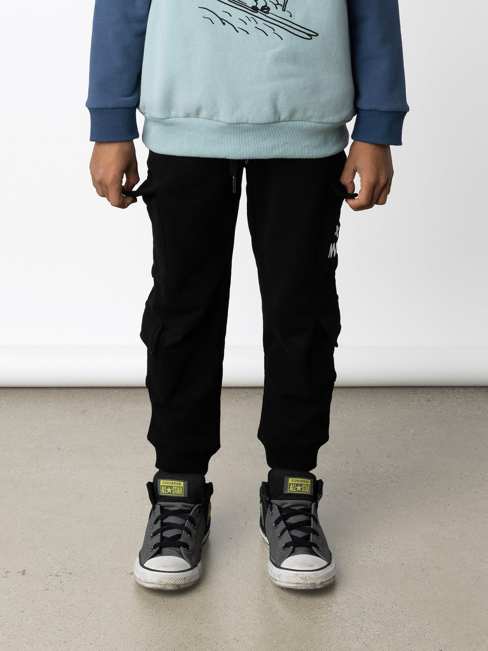 Minti kids clothing. Awesome trackies with slightly wider legs, elastic waistband, front pockets, shoestring cords and 4 super cool cargo pockets for treasures or cold hands. 330 Gram // Brushed Inside // 95% Cotton // 5% Elastane.