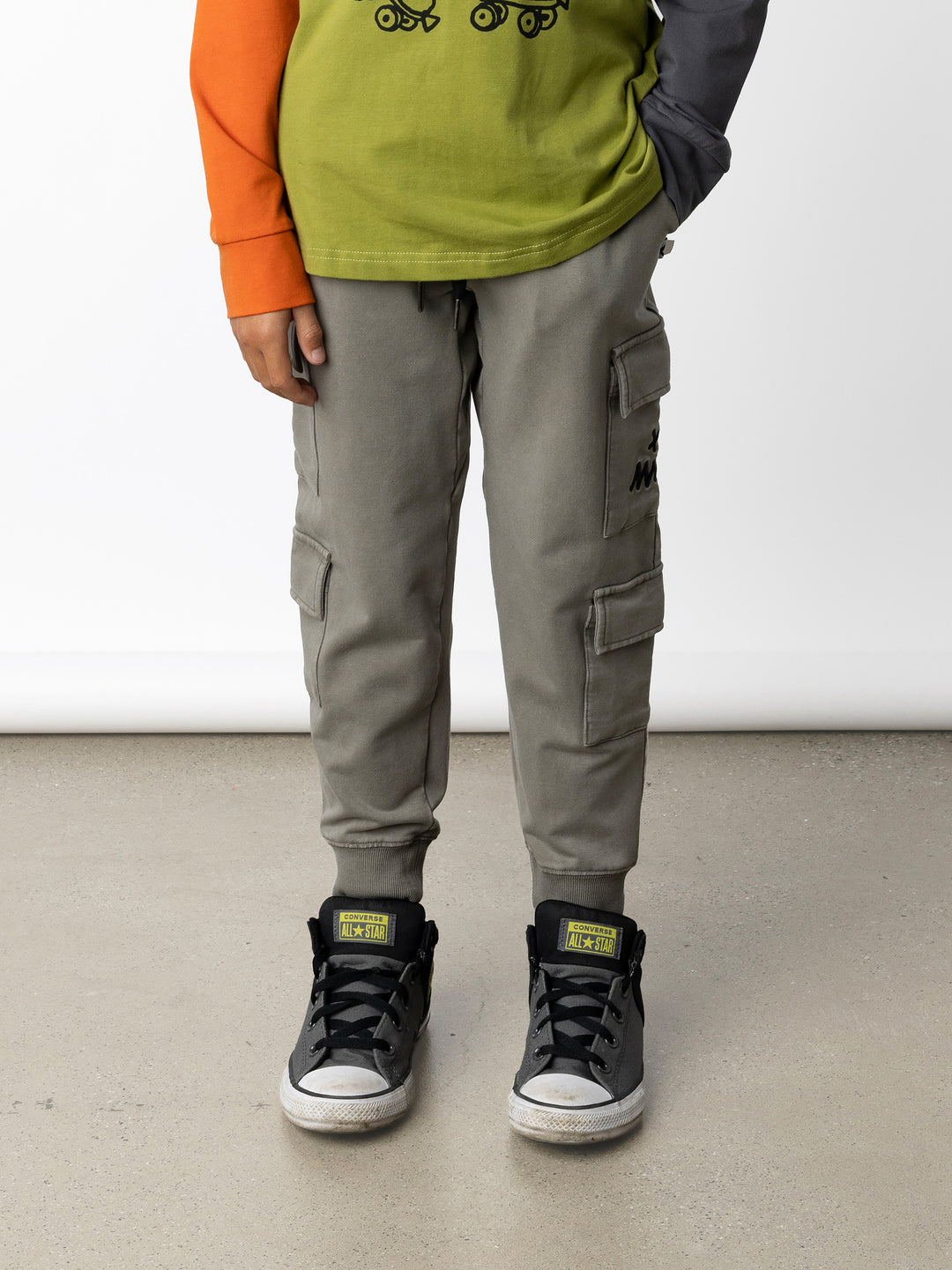 Minti kids clothing. Awesome trackies with slightly wider legs, elastic waistband, front pockets, shoestring cords and 4 super cool cargo pockets for treasures or cold hands. 260 Gram // 95% Cotton // 5% Elastane.