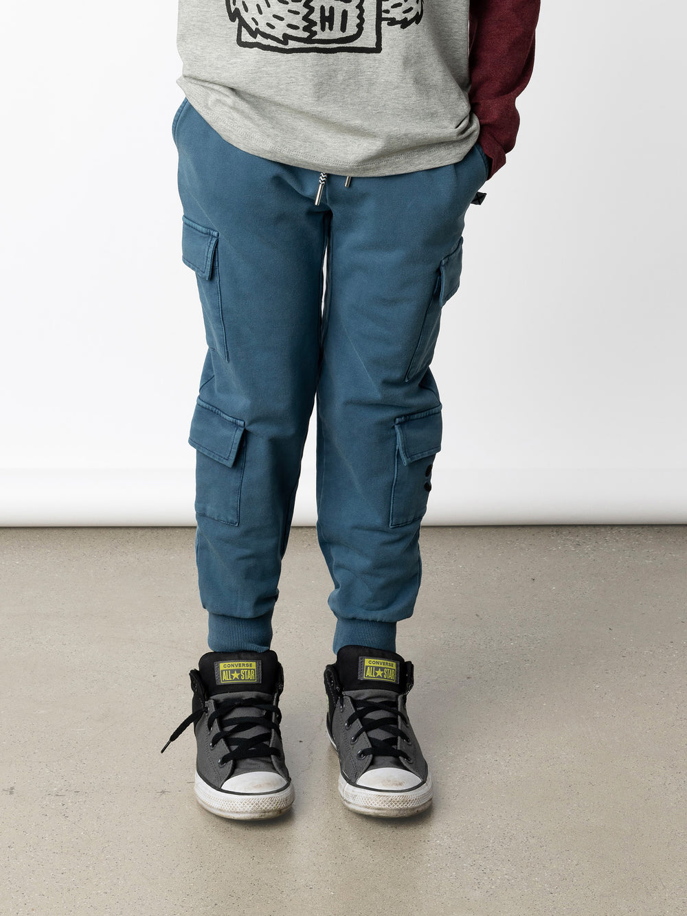 Minti kids clothing. Awesome trackies with slightly wider legs, elastic waistband, front pockets, shoestring cords and 4 super cool cargo pockets for treasures or cold hands. 260 Gram // 95% Cotton // 5% Elastane.