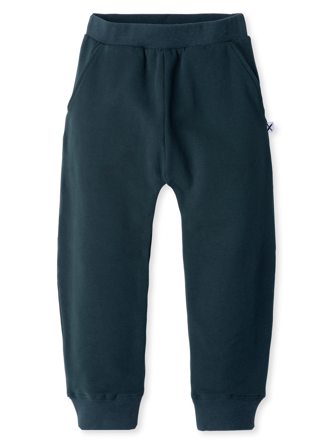 Minti kids clothing. Super cool baggy trackies with elastic waistband, front pockets, back pocket and 2x2 rib cuffs. 330 Gram // Brushed Inside // 95% Cotton // 5% Elastane.