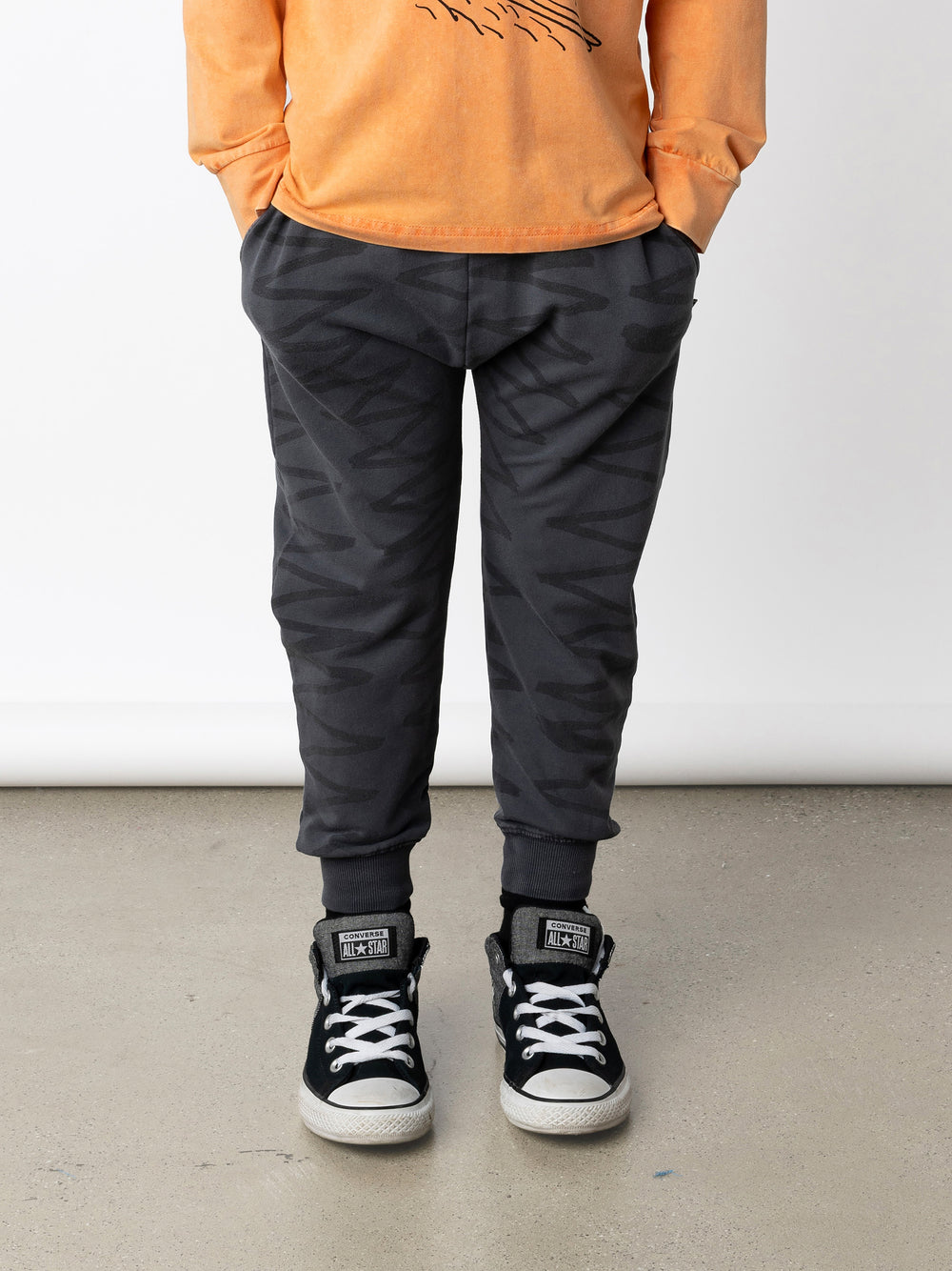 Minti kids clothing. Super cool baggy trackies with elastic waistband, front pockets, back pocket and 2x2 rib cuffs. 260 Gram // 95% Cotton // 5% Elastane.