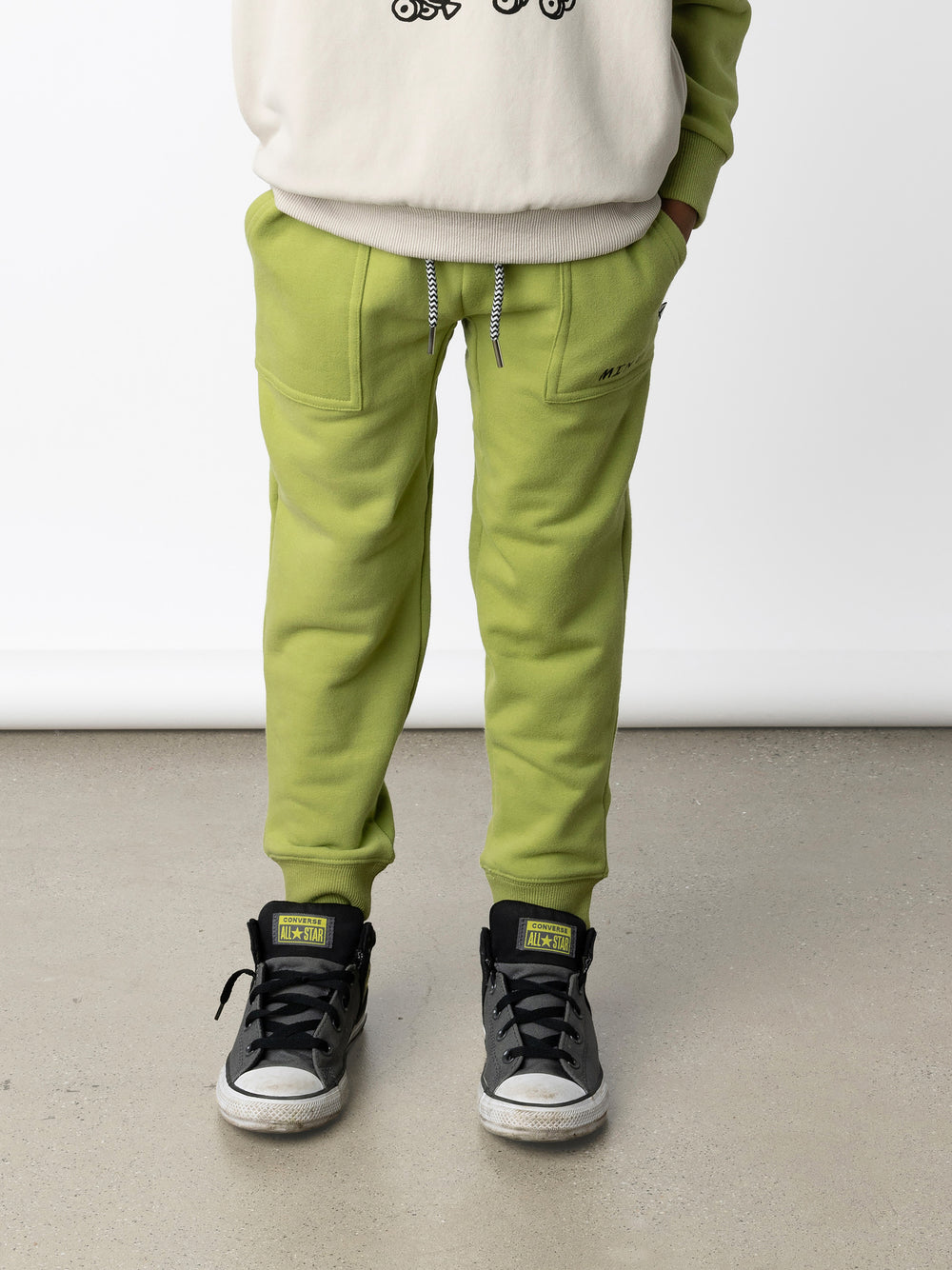 Minti kids clothing. Loose leg trackies with elasticated waistband, shoelace ties, 2x2 rib cuffs and super cool boxy pockets. 330 Gram // Brushed Inside // 95% Cotton // 5% Elastane.