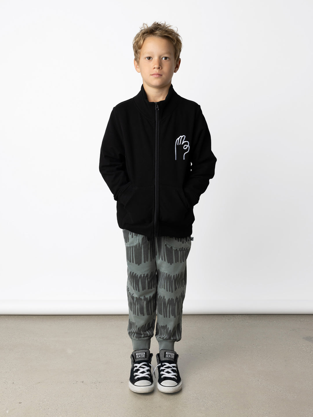 Minti kids clothing. Super cosy and soft zip up high neck crew with 2x2 Rib cuffs and hem. Front kangaroo pocket to keep hands warm. 330 Gram // Brushed Inside // 95% Cotton // 5% Elastane.
