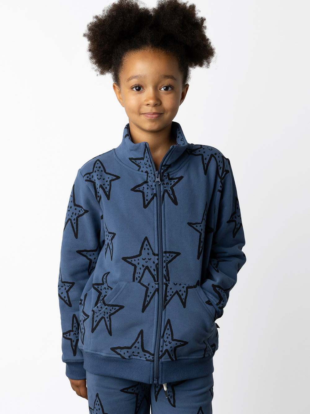 Minti kids clothing. Super cosy and soft zip up high neck crew with 2x2 Rib cuffs and hem. Front kangaroo pocket to keep hands warm. 330 Gram // Brushed Inside // 95% Cotton // 5% Elastane.