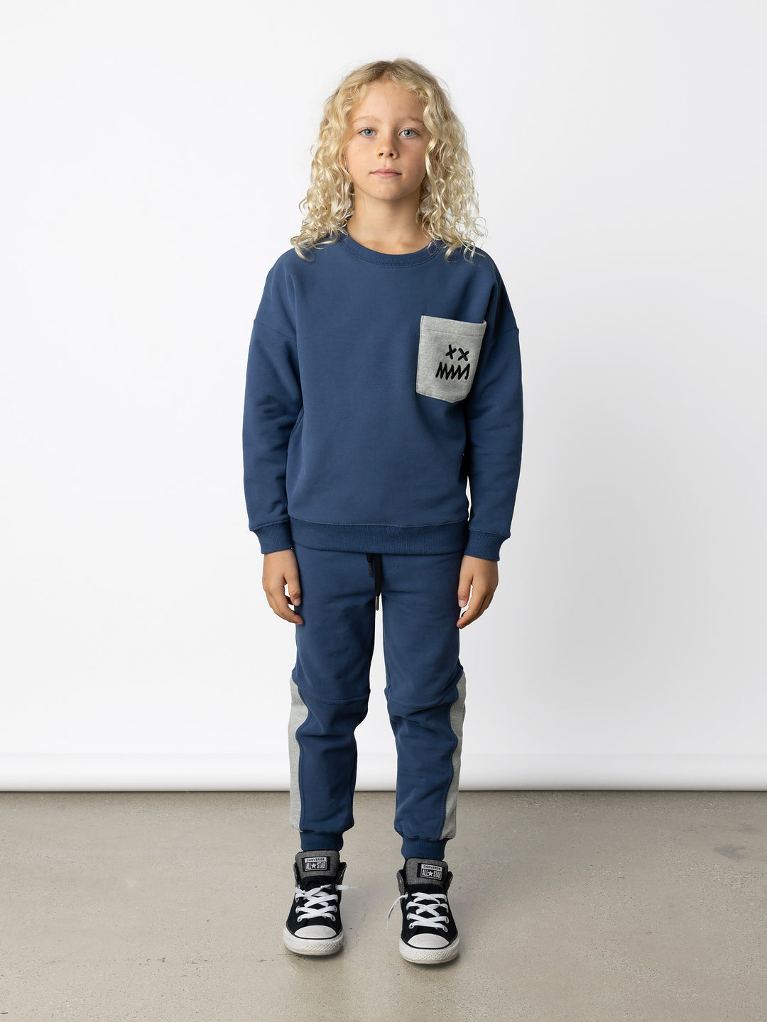 Minti kids clothing. Super cosy oversized fit crew with drop shoulder detail and cool front pocket. 2x2 Rib at the neck, hem and cuffs. 330 Gram // Brushed Inside // 95% Cotton // 5% Elastane.