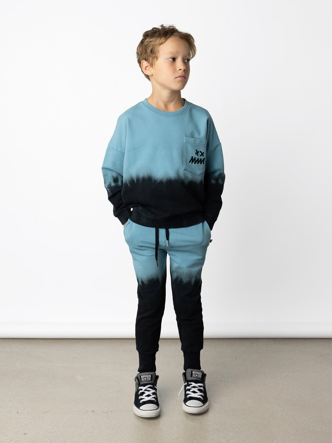 Minti kids clothing. Super cosy oversized fit crew with drop shoulder detail and cool front pocket. 2x2 Rib at the neck, hem and cuffs. 320 Gram // 95% Cotton // 5% Elastane.