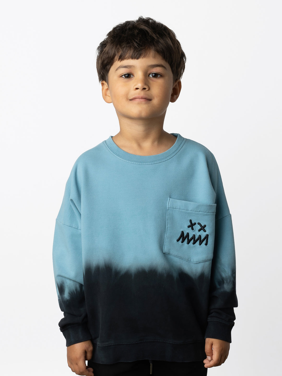 Minti kids clothing. Super cosy oversized fit crew with drop shoulder detail and cool front pocket. 2x2 Rib at the neck, hem and cuffs. 320 Gram // 95% Cotton // 5% Elastane.
