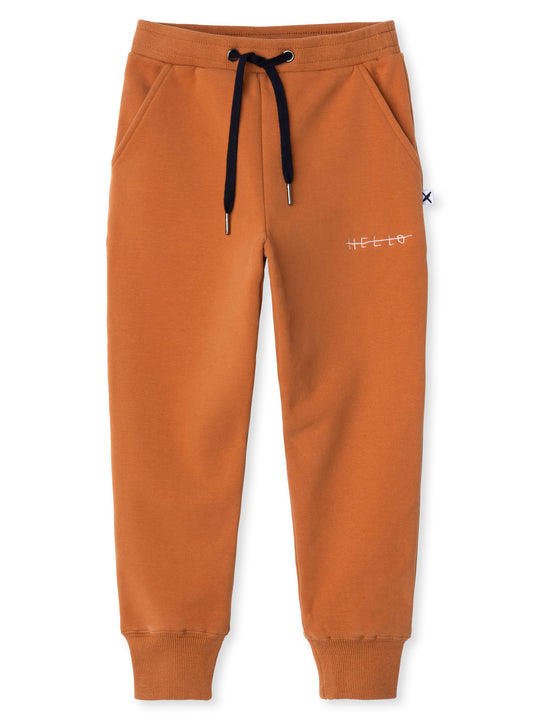 Minti kids clothing. Straight leg trackies with rounded front pockets, elastic waistband, shoelace ties, 2x2 rib cuffs and a small embroidery on the front. 330 Gram // Brushed Inside // 95% Cotton // 5% Elastane.