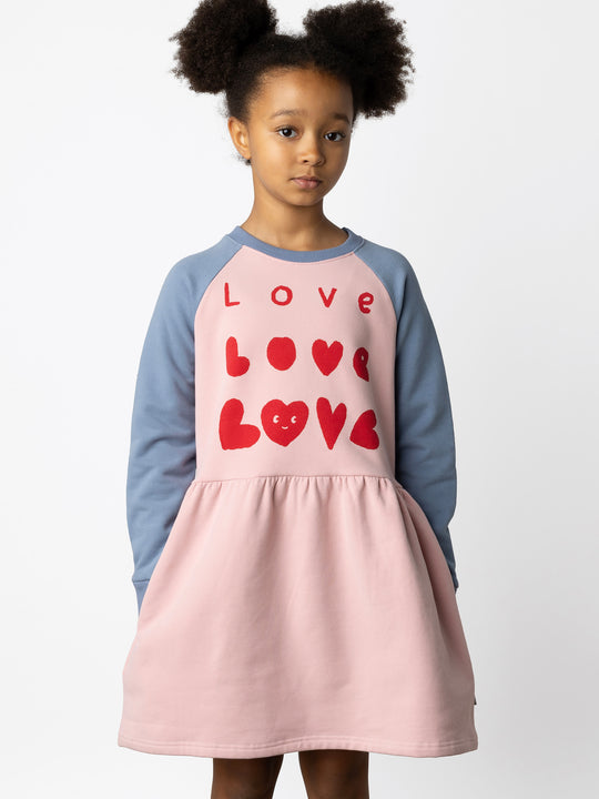 Minti kids clothing. Sweatshirting dress with raglan sleeves, ruched skirt seam and hidden side pockets. 330 Gram // Brushed Inside // 95% Cotton // 5% Elastane.