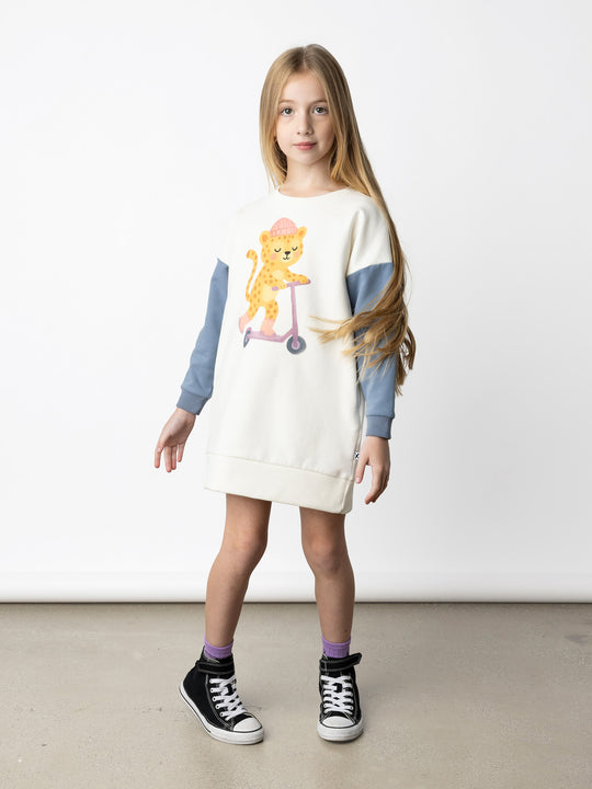Minti kids clothing. Super cosy sweatshirting weight dress with drop shoulder detail. 2x2 Rib at the neck, hem and cuffs. Hidden side pockets. 330 Gram // Brushed Inside // 95% Cotton // 5% Elastane.