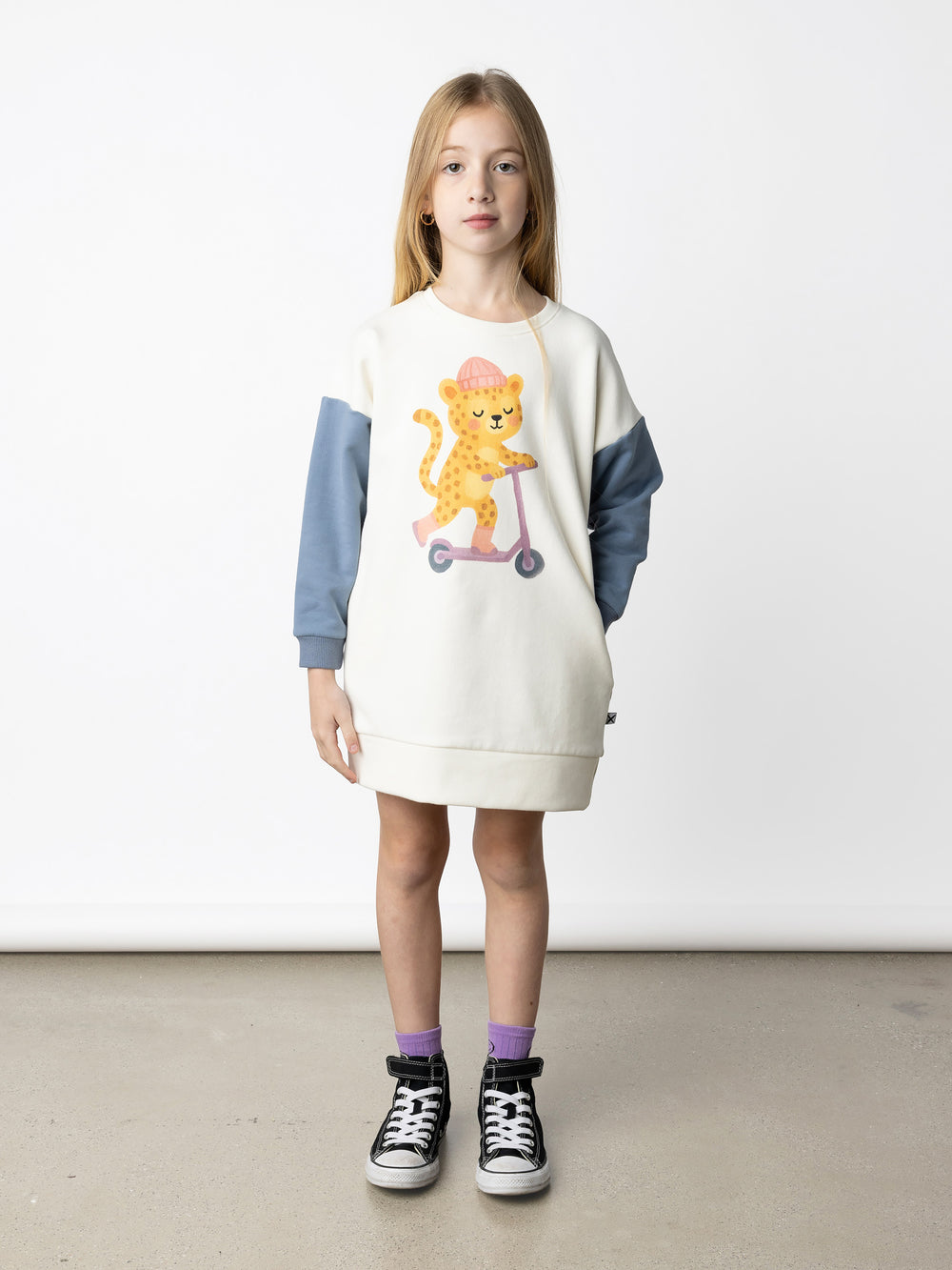 Minti kids clothing. Super cosy sweatshirting weight dress with drop shoulder detail. 2x2 Rib at the neck, hem and cuffs. Hidden side pockets. 330 Gram // Brushed Inside // 95% Cotton // 5% Elastane.