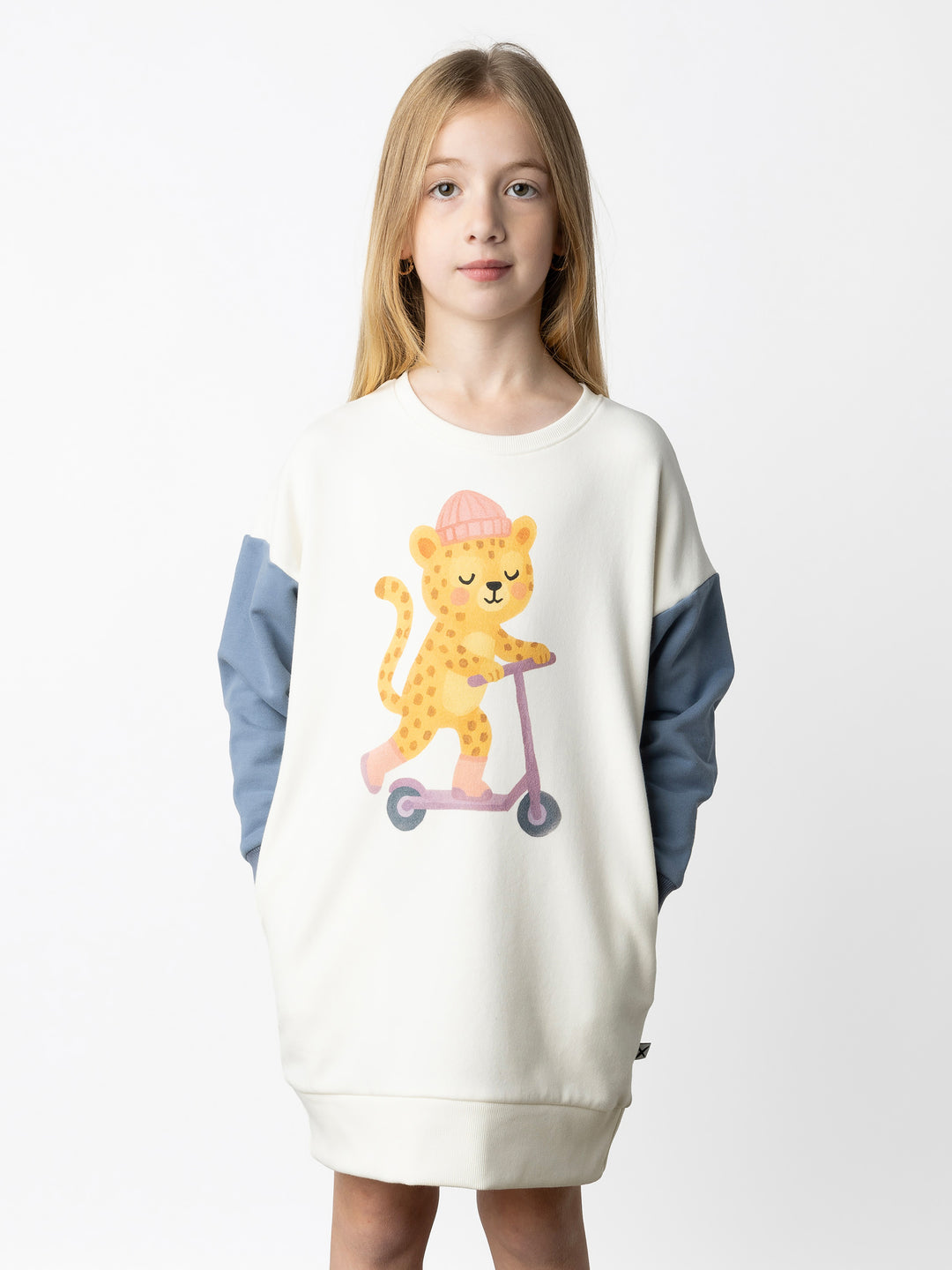 Minti kids clothing. Super cosy sweatshirting weight dress with drop shoulder detail. 2x2 Rib at the neck, hem and cuffs. Hidden side pockets. 330 Gram // Brushed Inside // 95% Cotton // 5% Elastane.
