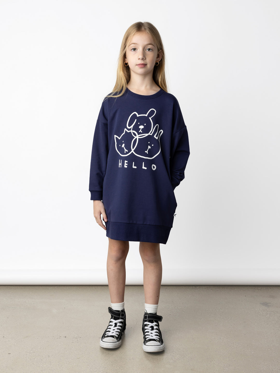 Minti kids clothing. Super cosy sweatshirting weight dress with drop shoulder detail. 2x2 Rib at the neck, hem and cuffs. Hidden side pockets. 320 Gram // 95% Cotton // 5% Elastane.