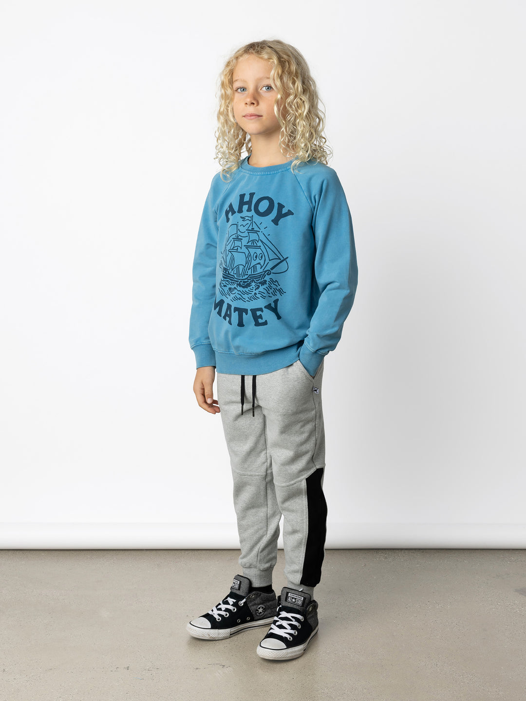 Minti kids clothing. Comfy lightweight raglan crew in super cool washed terry. 260 Gram // 95% Cotton // 5% Elastane.