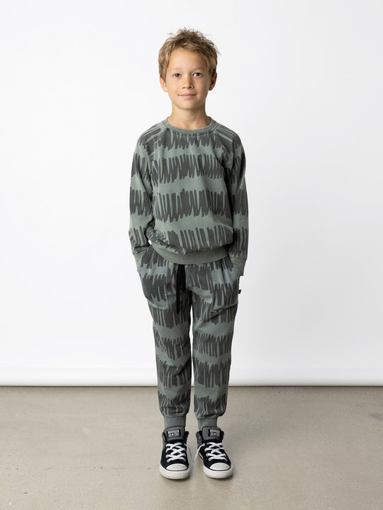 Minti kids clothing. Comfy lightweight raglan crew in super cool washed terry. 260 Gram // 95% Cotton // 5% Elastane.
