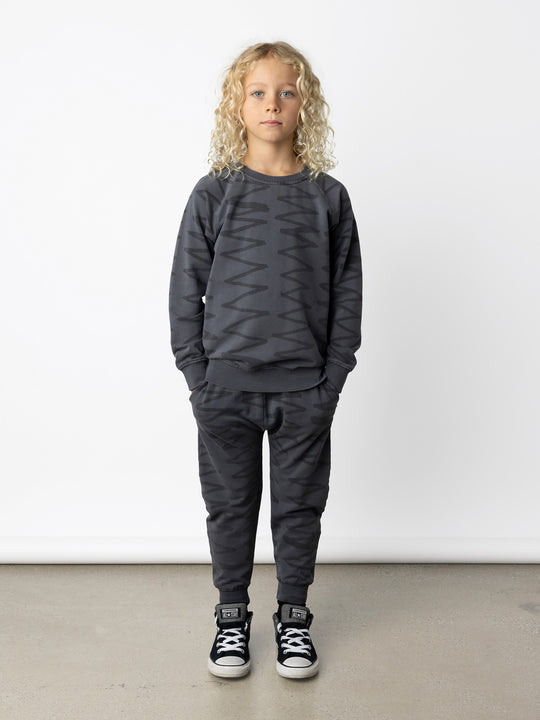 Minti kids clothing. Comfy lightweight raglan crew in super cool washed terry. 260 Gram // 95% Cotton // 5% Elastane.