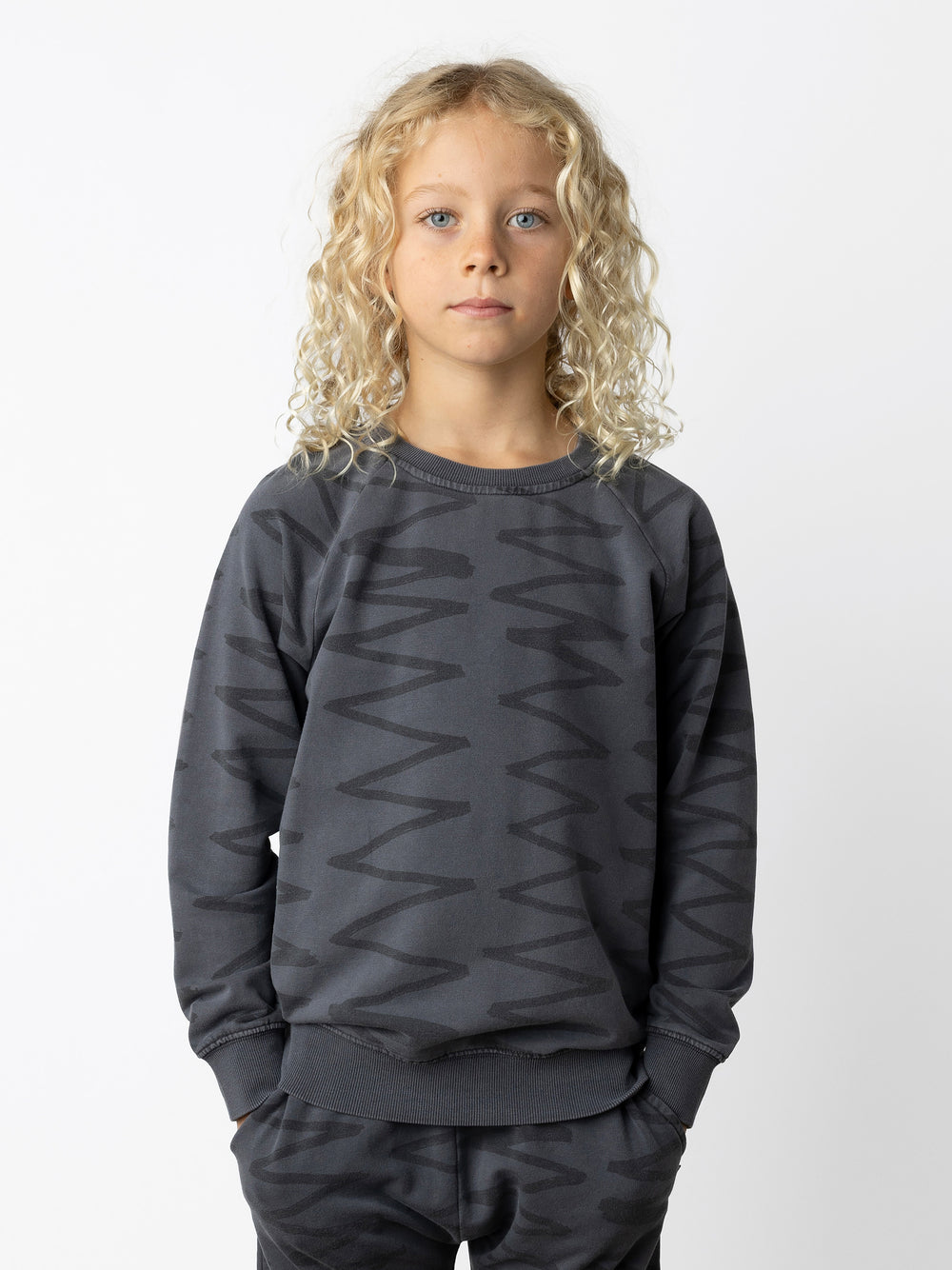 Minti kids clothing. Comfy lightweight raglan crew in super cool washed terry. 260 Gram // 95% Cotton // 5% Elastane.