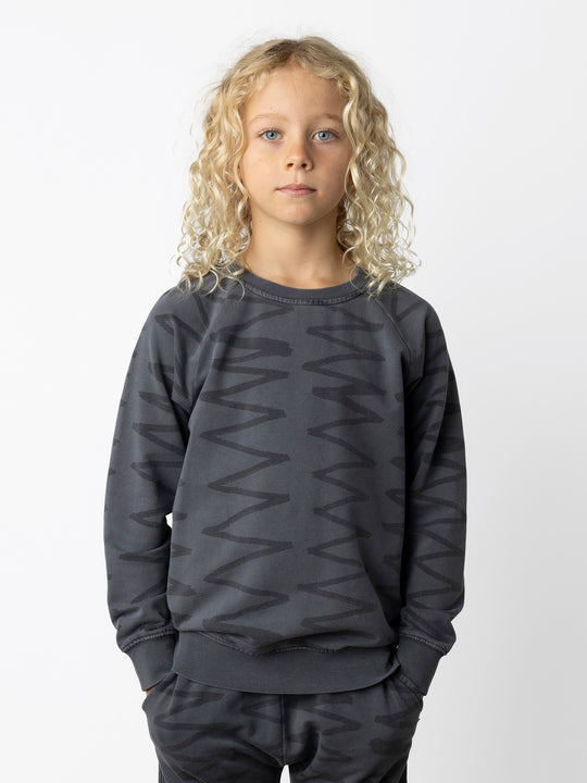 Minti kids clothing. Comfy lightweight raglan crew in super cool washed terry. 260 Gram // 95% Cotton // 5% Elastane.