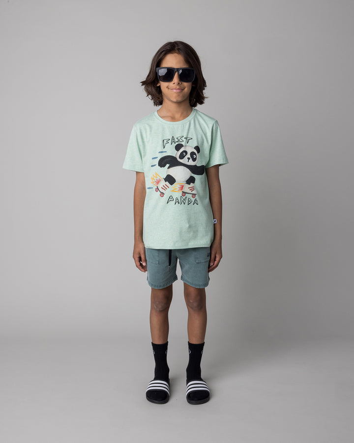 Kid wearing the Fast Panda Tee in green marle with the Blasted Track Short in forest wash, front view