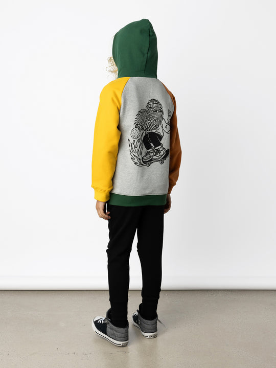 Minti kids clothing. Cosy zip through hoodie with kangaroo pockets for extra warmth! 2x2 rib trim on the hood, cuffs and hem. Small embroidery on the front and big print on the back. 330 Gram // Brushed Inside // 95% Cotton // 5% Elastane.
