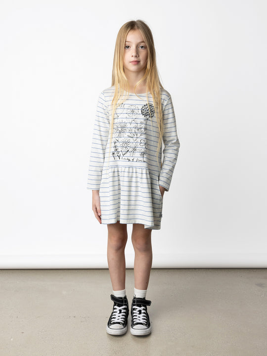 Minti kids clothing. Comfy tshirting weight dress with ruched skirt seam, front pockets and scooped back hem. 180 Gram // 95% Cotton // 5% Elastane.