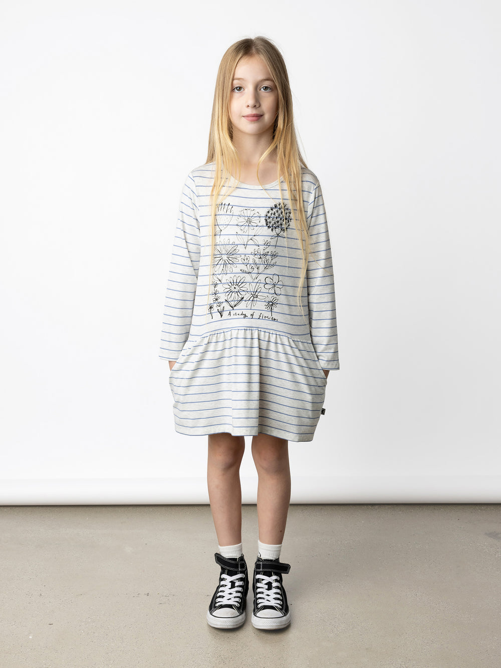 Minti kids clothing. Comfy tshirting weight dress with ruched skirt seam, front pockets and scooped back hem. 180 Gram // 95% Cotton // 5% Elastane.