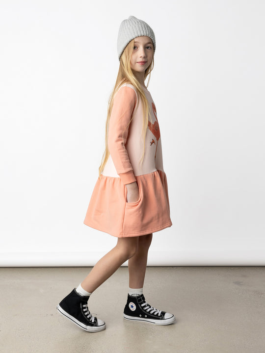 Minti kids clothing. Super cool sweatshirting weight dress with dropped skirt hem, pockets and ruching at the skirt seam. 330 Gram // Brushed Inside // 95% Cotton // 5% Elastane.