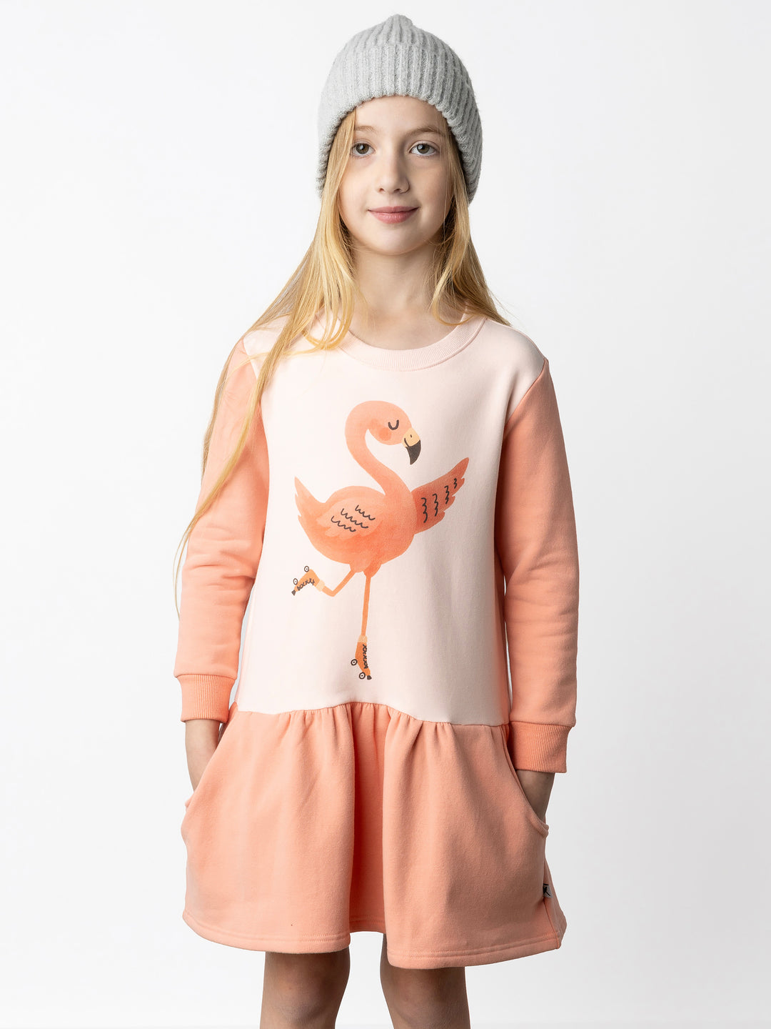 Minti kids clothing. Super cool sweatshirting weight dress with dropped skirt hem, pockets and ruching at the skirt seam. 330 Gram // Brushed Inside // 95% Cotton // 5% Elastane.