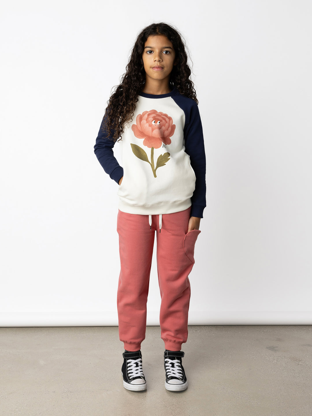 Minti kids clothing. Super comfy crew with rounded side pockets. 330 Gram // Brushed Inside // 95% Cotton // 5% Elastane.
