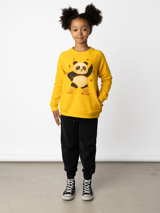 Minti kids clothing. Super comfy crew with rounded side pockets. 330 Gram // Brushed Inside // 95% Cotton // 5% Elastane.