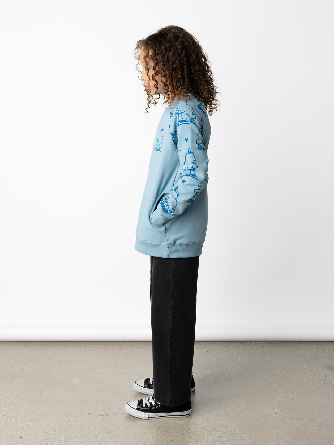 Minti kids clothing. Super comfy crew with rounded side pockets. 330 Gram // Brushed Inside // 95% Cotton // 5% Elastane.