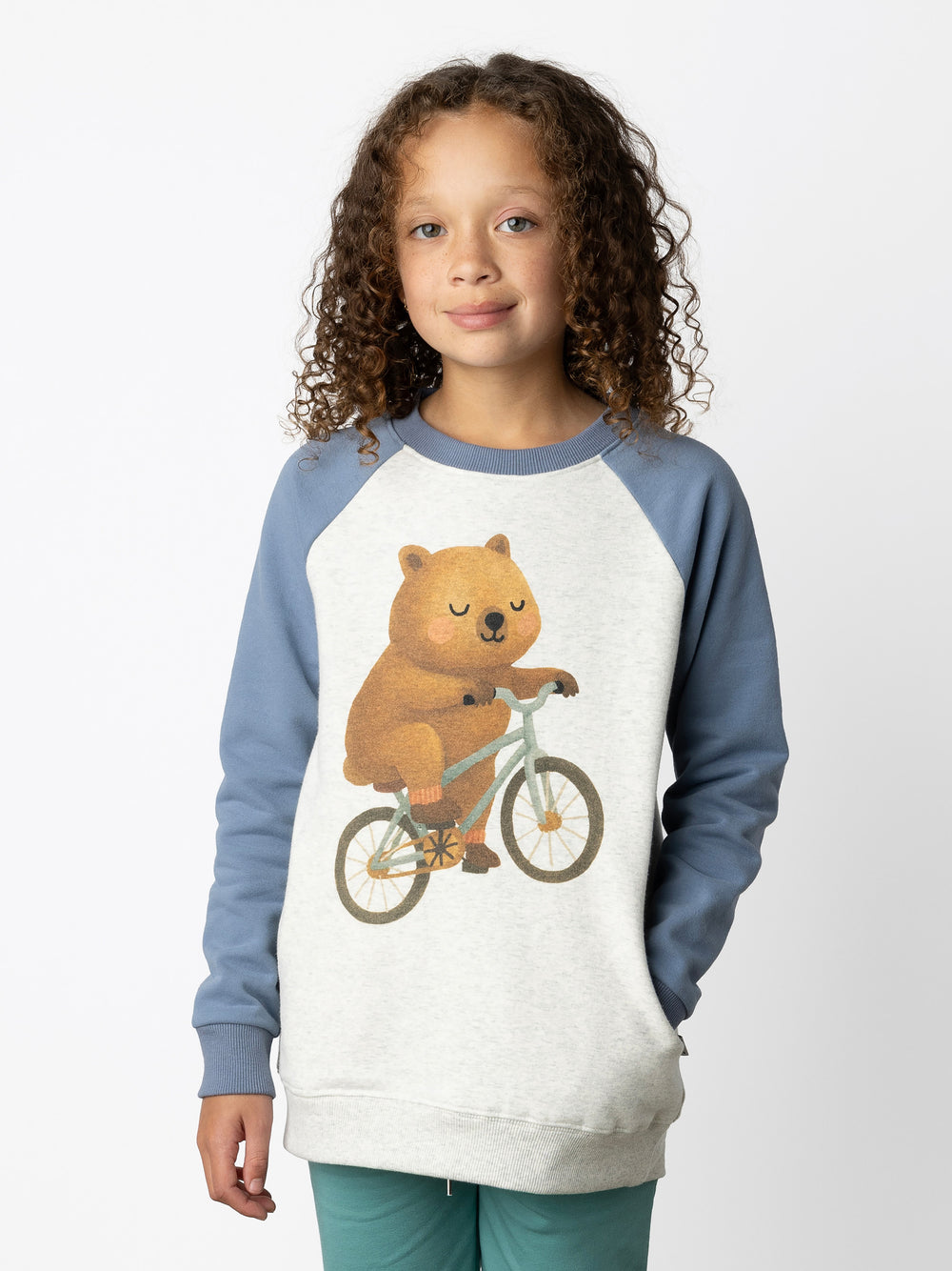 Minti kids clothing. Super comfy crew with rounded side pockets. 330 Gram // Brushed Inside // 95% Cotton // 5% Elastane.