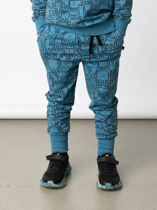 Minti kids clothing. Straight leg trackies with stitched detail pockets, elasticated waistband, shoelace ties and back pocket. 260 Gram // 95% Cotton // 5% Elastane.